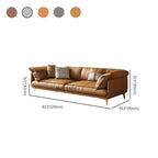 Grey and amber color sofa with pillows