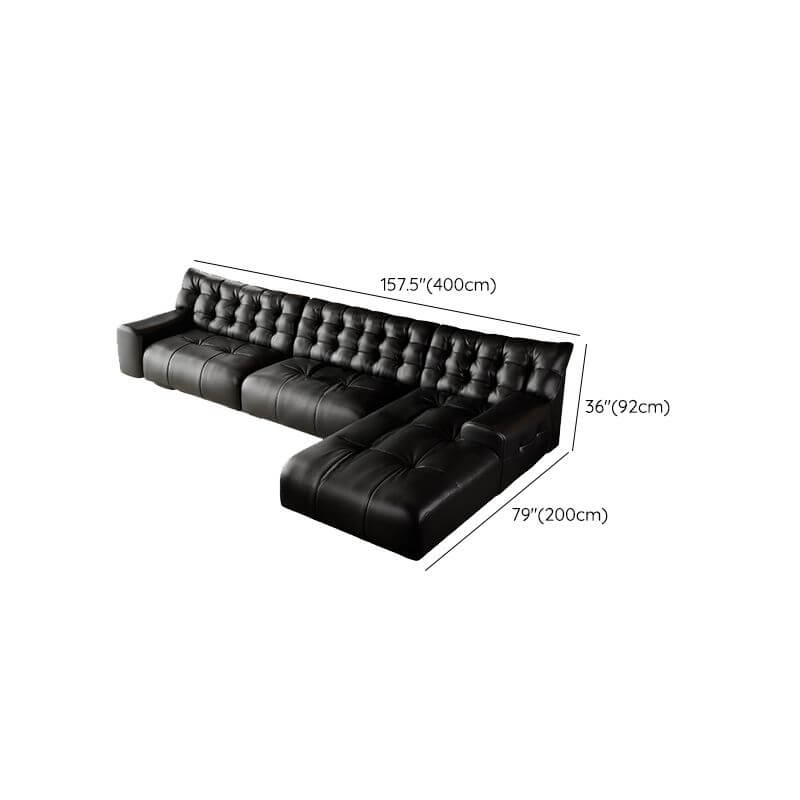 Elegant black sofa with tufted detail