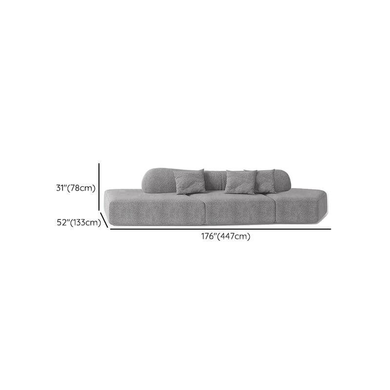 Button-tufted detail on sectional