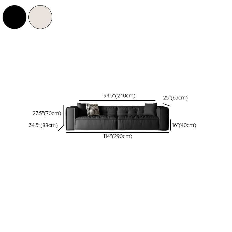 Close-up of pillows on loveseat