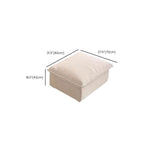 Elegant beige footstool next to a contemporary chair