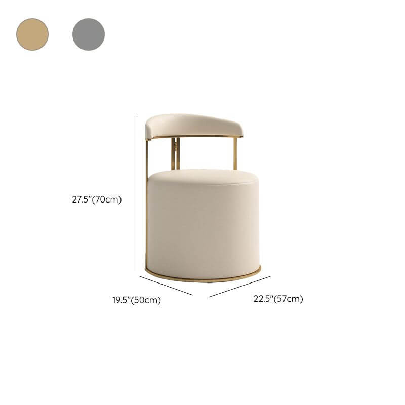 Upholstered vanity stool adding elegance to a modern bathroom