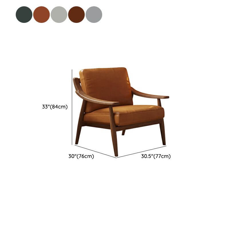 olive green arm chair with wood armrests