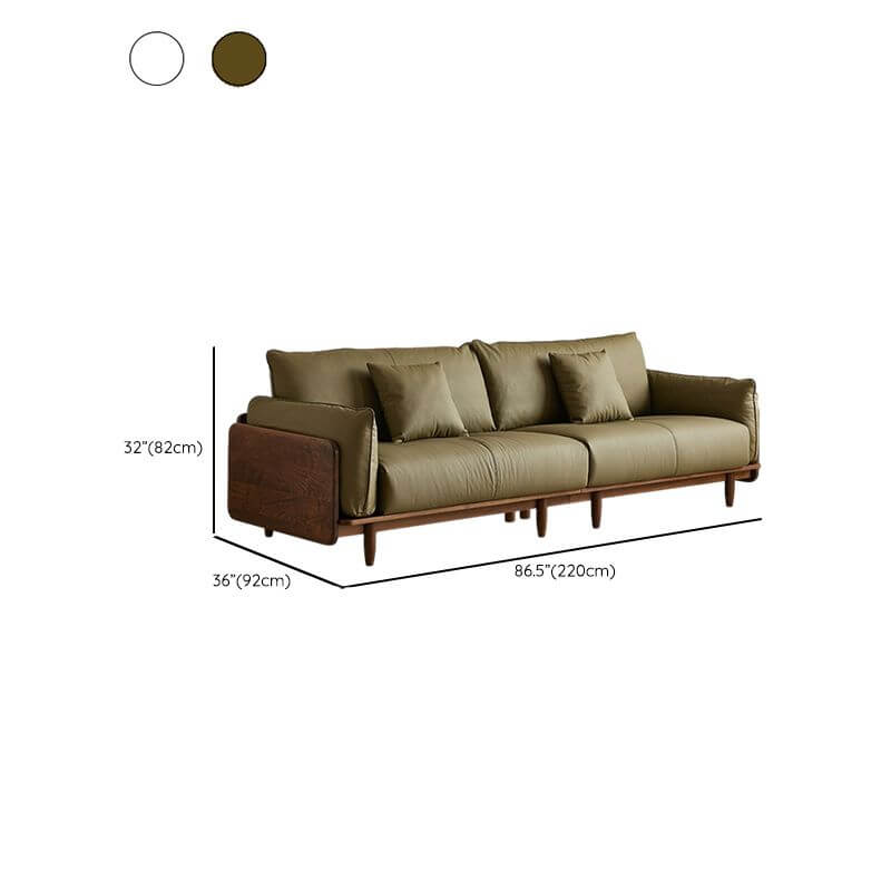 beige sofa with pillows