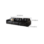 Cozy seating area with black sofa