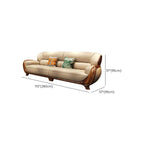 Elegant camel back sofa in living room setting