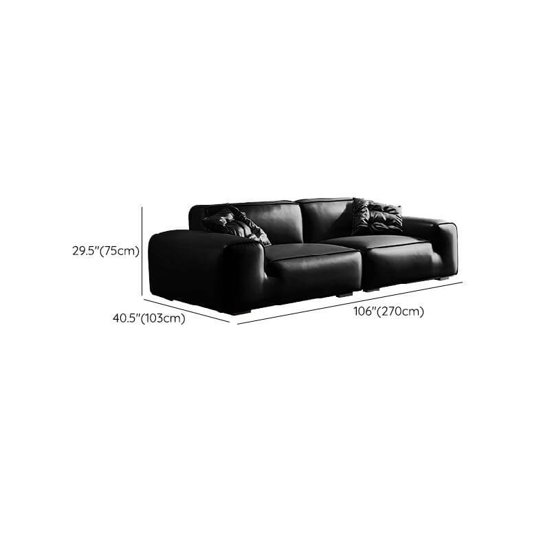 Leather loveseat with armrests in contemporary space