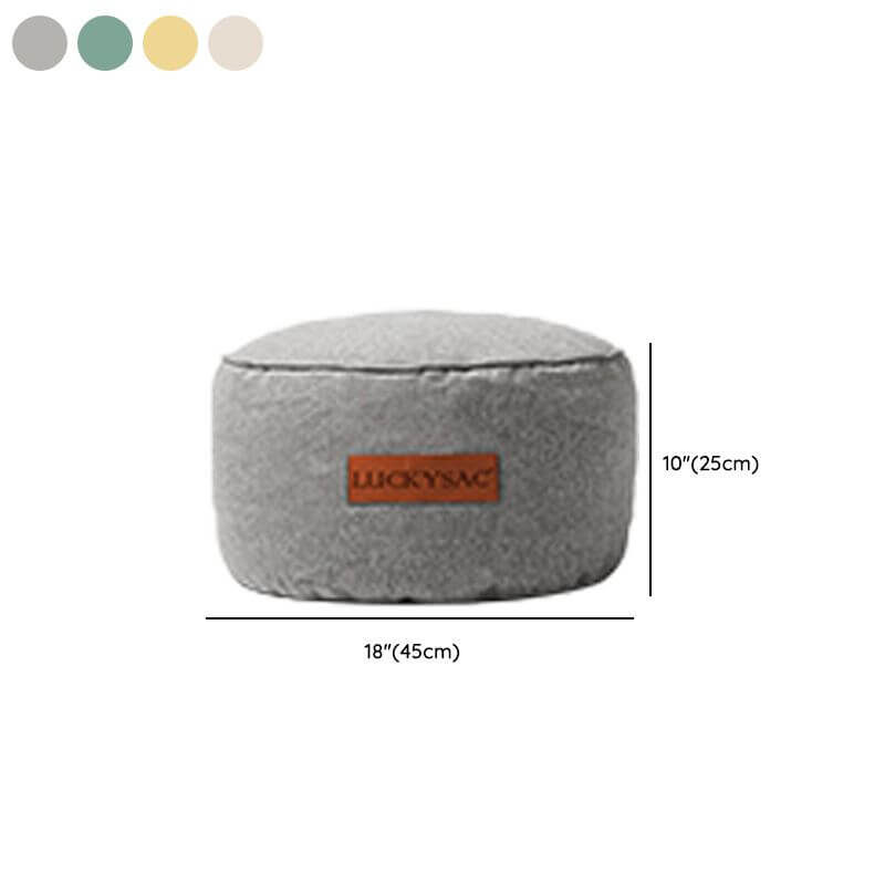 Stylish gray bean bag chair in living room