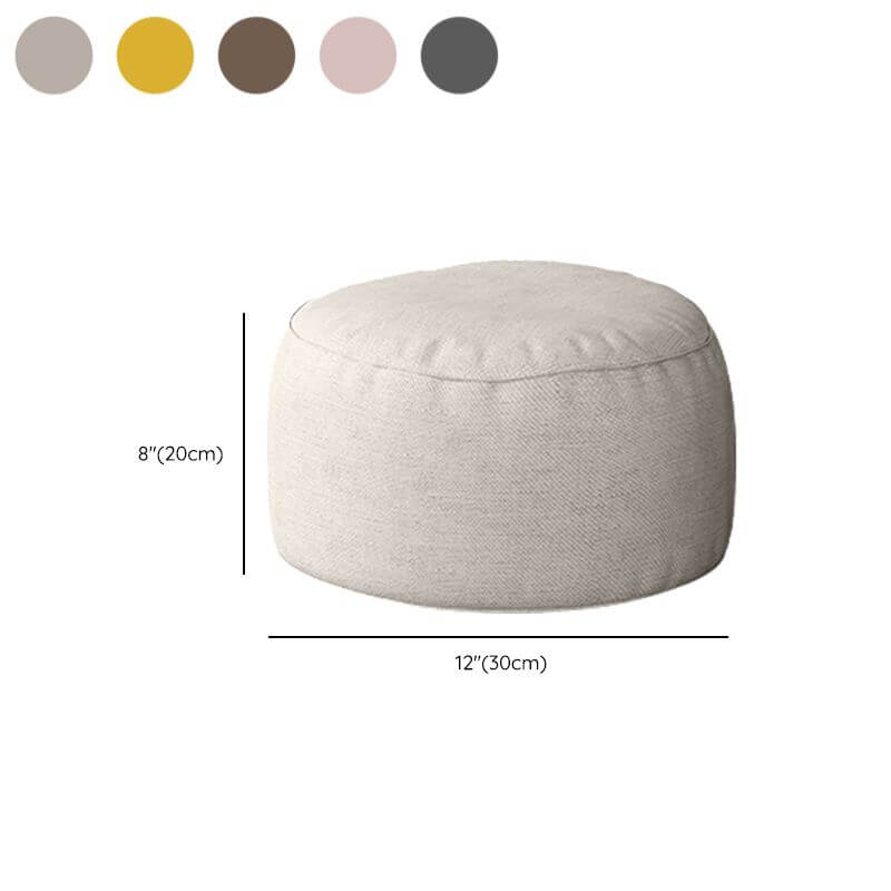 Large light coffee bean bag chair in living room