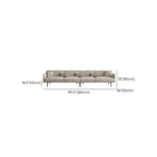 Cozy corner featuring a grey upholstered sofa