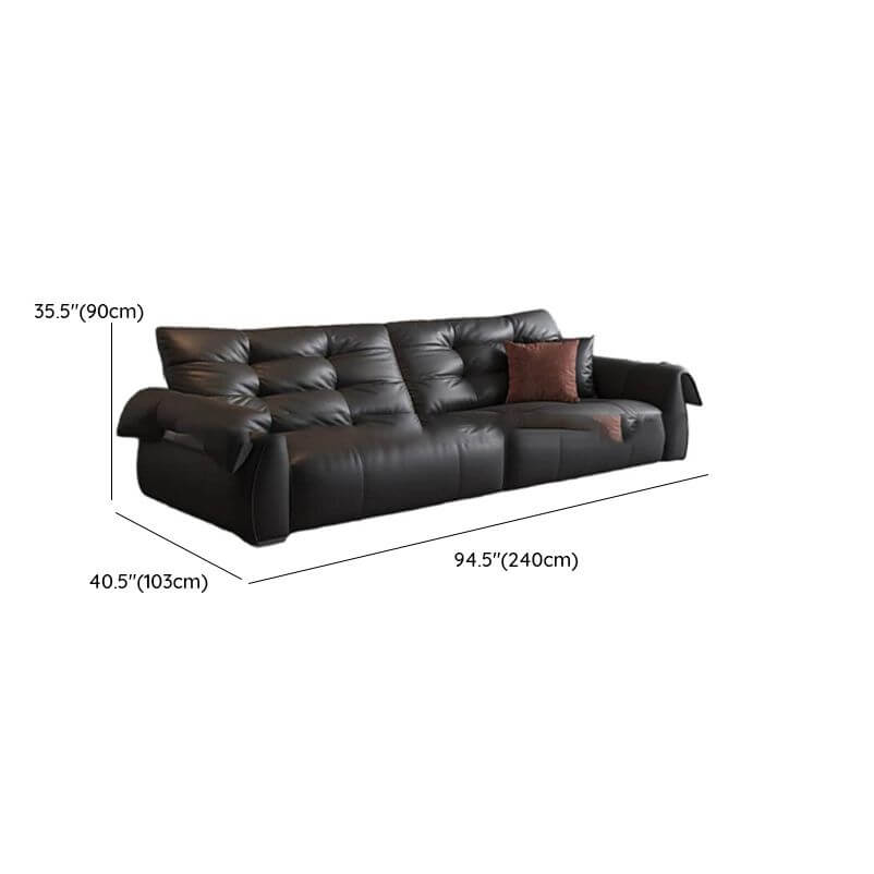 comfortable black sofa with cushions