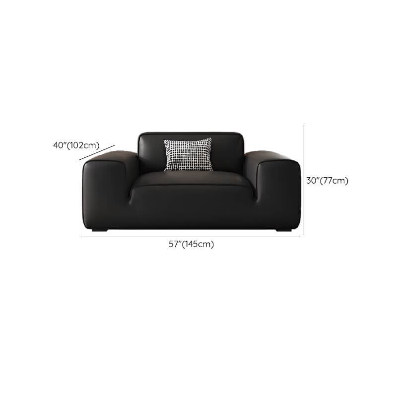 Stylish modern black sofa in living room