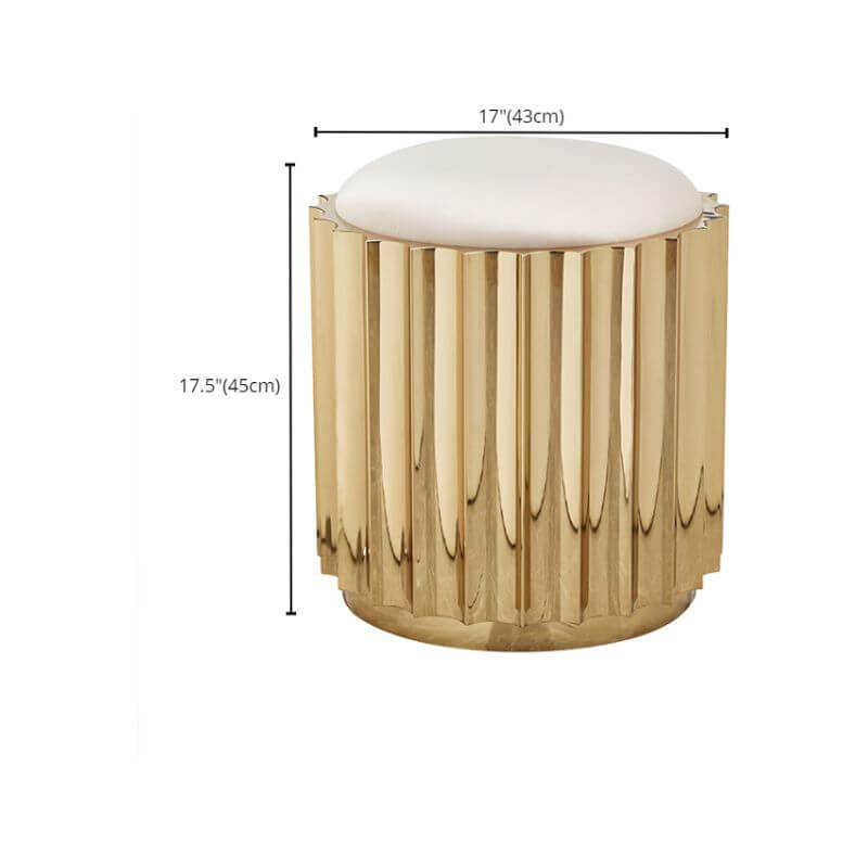 Gold metal drum base of the upholstered stool