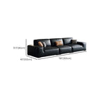Elegant black sofa couch with plush cushions