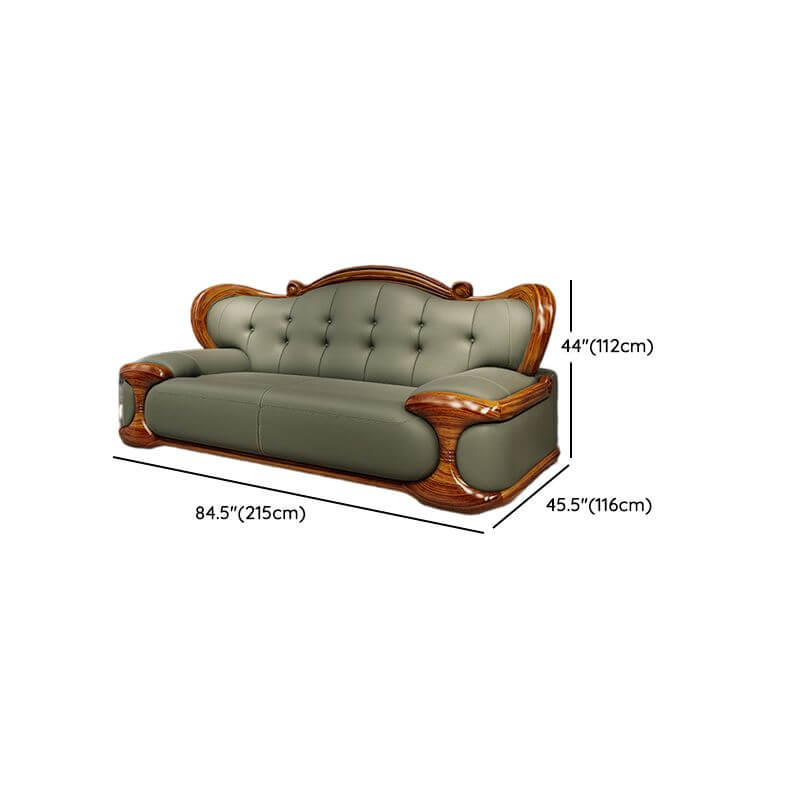 olive green loveseat with plush cushions