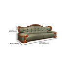 olive green full-size sofa in living room