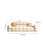Plush cushions on trendy sofa