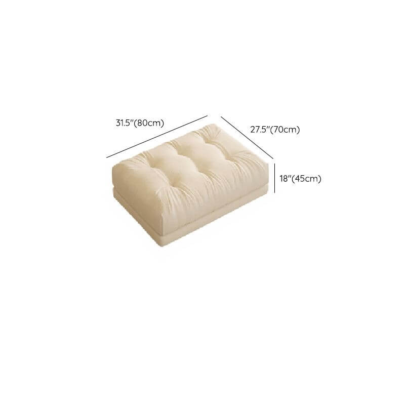 Profile view of the cream sofa