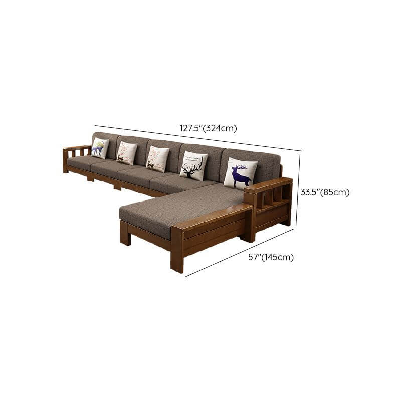 Natural wood accents on the grey sofa