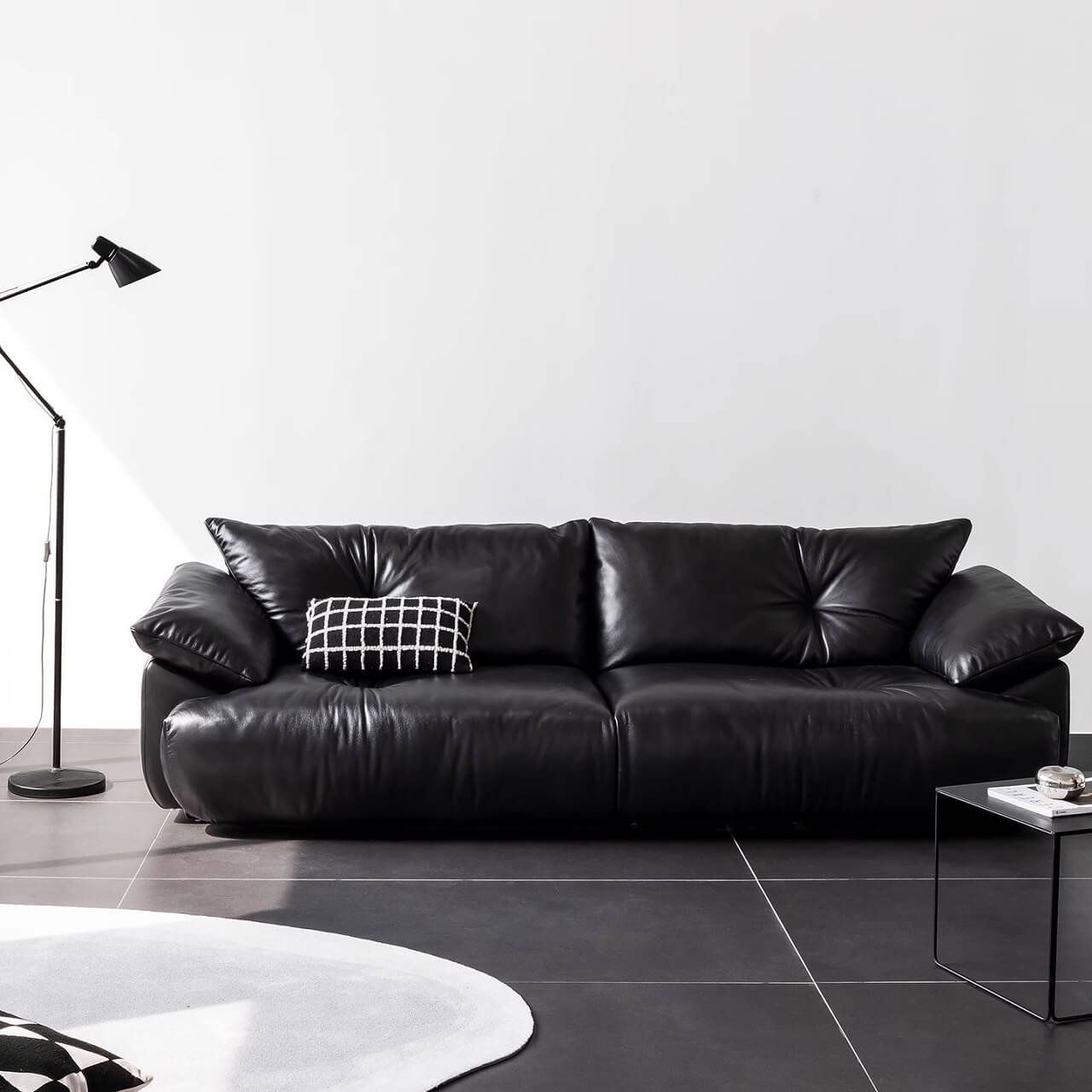 Black microfiber leather sofa with sleek minimalist design for comfort and style main product image メイン画像