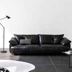 Sleek black microfiber leather sofa in minimalist style