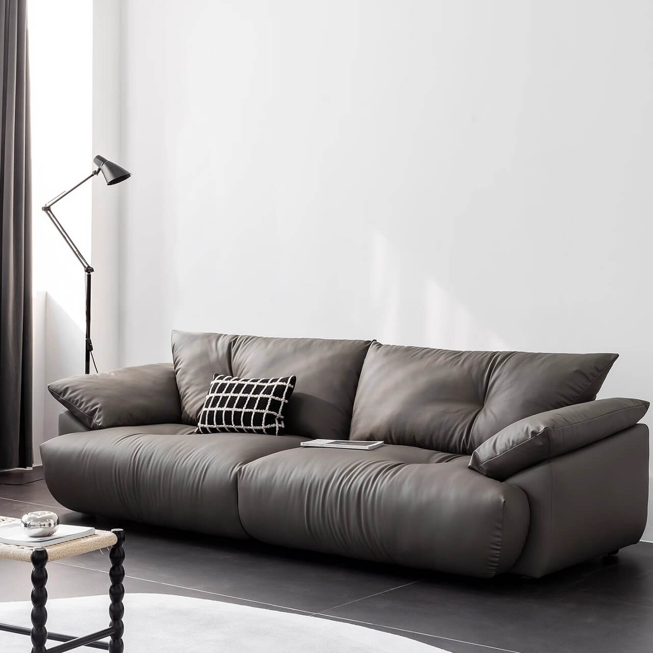 Black microfiber leather sofa with sleek minimalist design for comfort and style