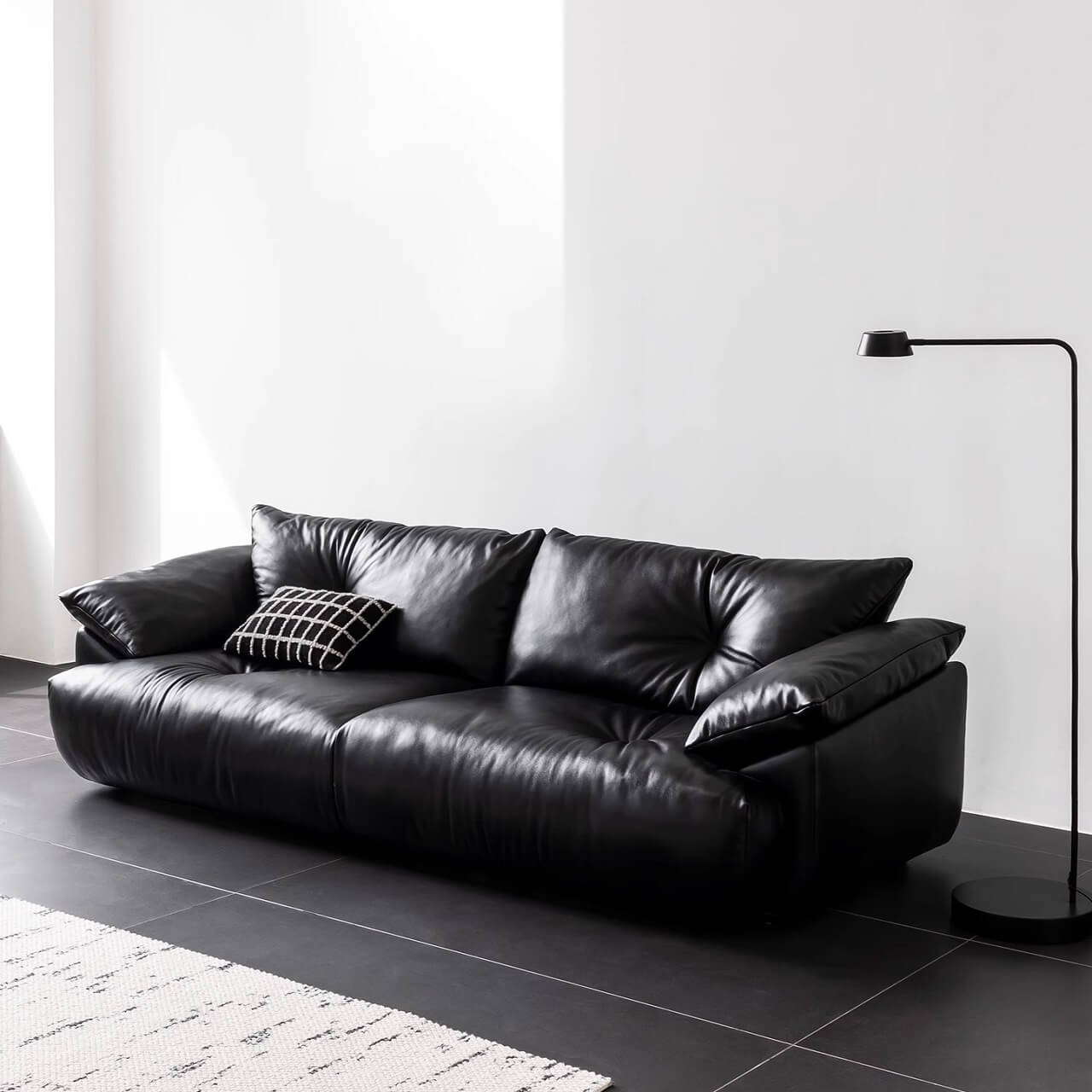 Black microfiber leather sofa with sleek minimalist design for comfort and style Main image