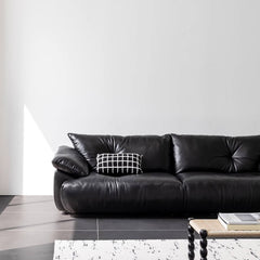 Contemporary black leather sofa combining comfort and style