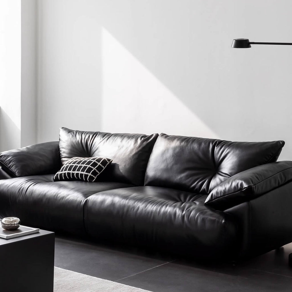 Black microfiber leather sofa with sleek minimalist design for comfort and style