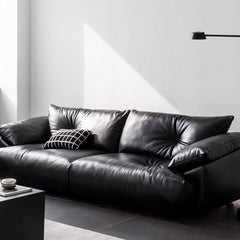 Sleek and stylish black sofa in microfiber leather finish