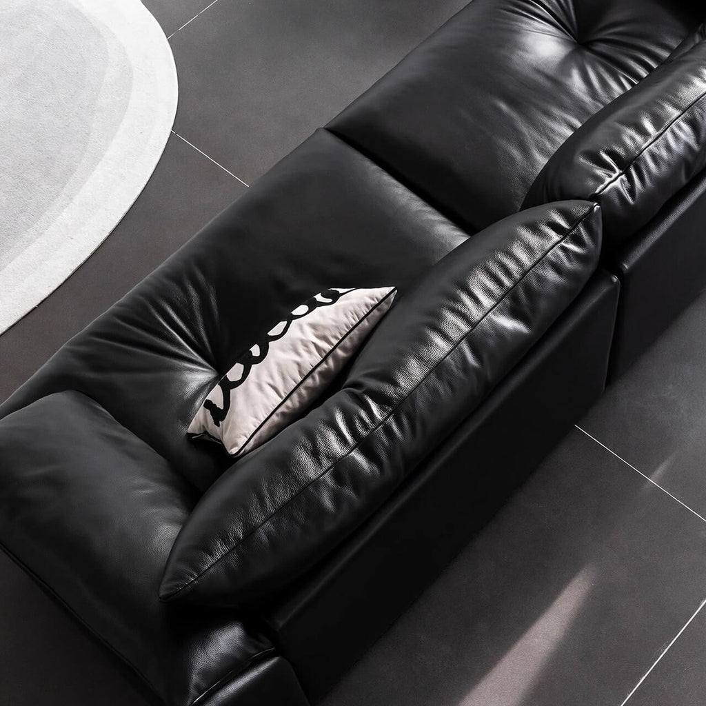 Black microfiber leather sofa with sleek minimalist design for comfort and style