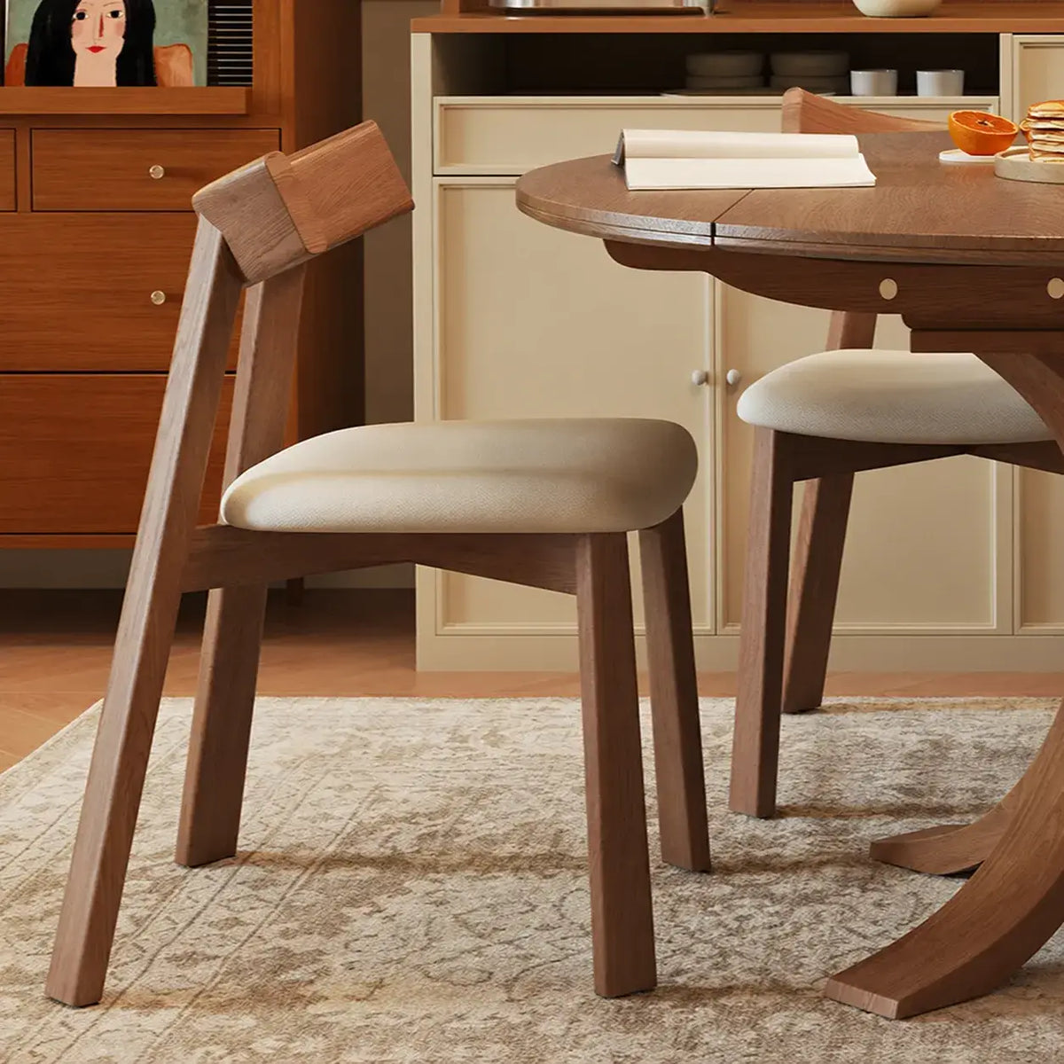 Solid Wood Extendable Dining Table with Sculptural Pedestal for Small Spaces