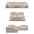 Topographic Lounge Sofa Featuring Tiered Cushioning and Flexible Reconfiguration