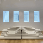 Topographic Lounge Sofa Featuring Tiered Cushioning and Flexible Reconfiguration