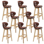 Tufted Leather Bar Stool with Low Curved Back and X-Brace Wood Legs