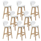 Tufted Leather Bar Stool with Low Curved Back and X-Brace Wood Legs