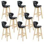 Tufted Leather Bar Stool with Low Curved Back and X-Brace Wood Legs
