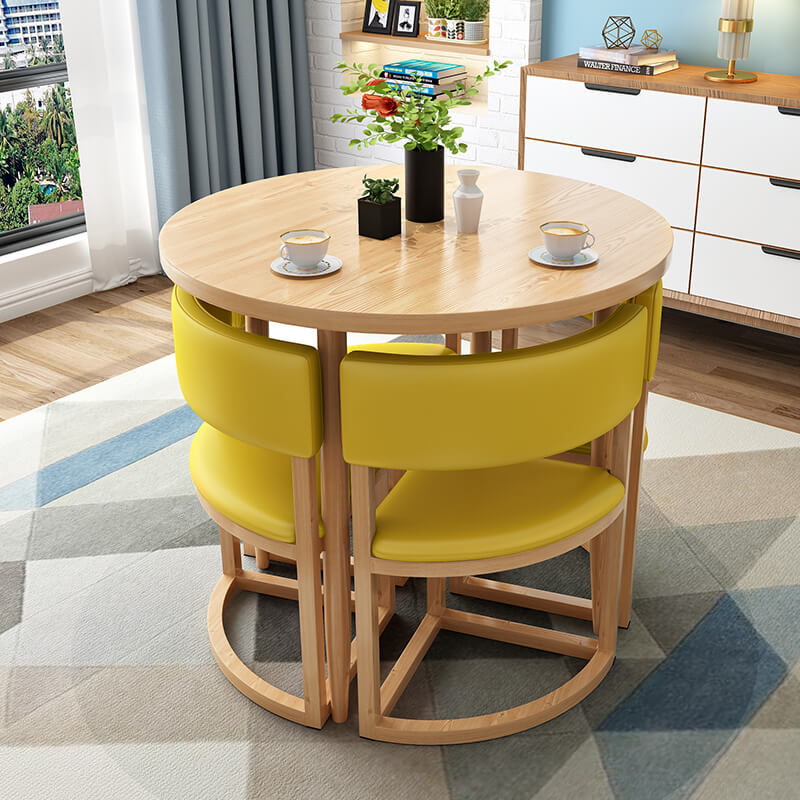 Versatile Round Table With Comfortable Nesting Chairs