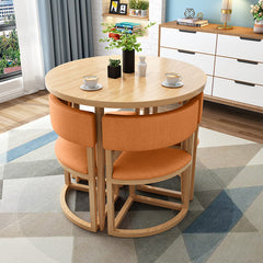 Versatile Round Table With Comfortable Nesting Chairs