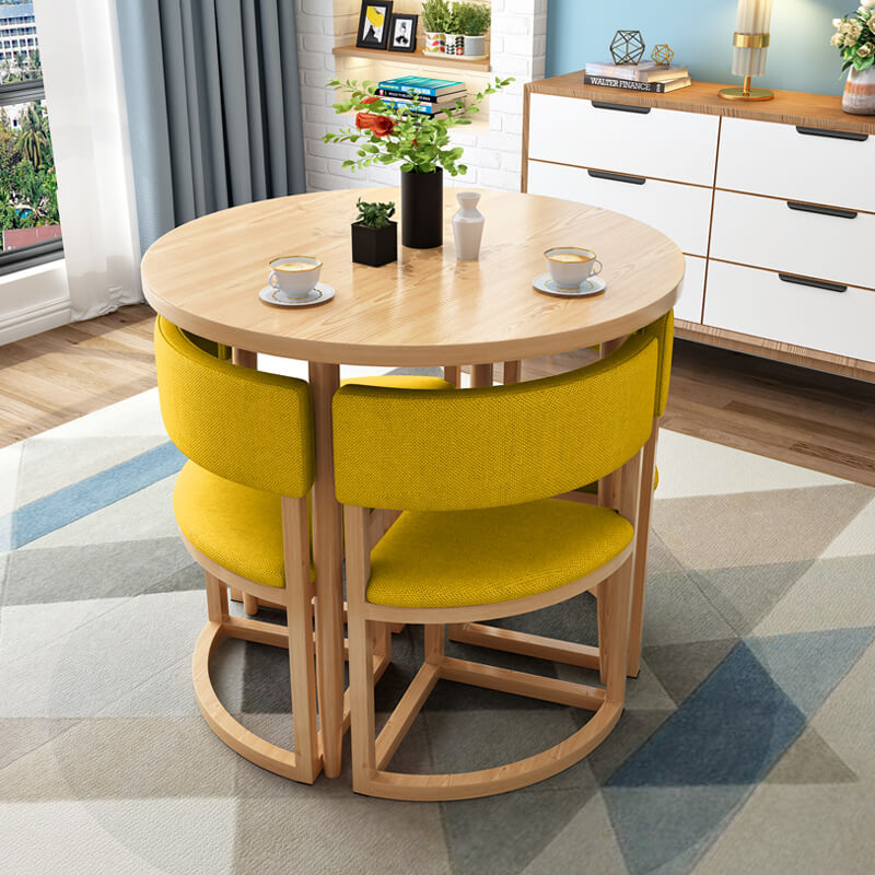 Versatile Round Table With Comfortable Nesting Chairs