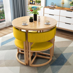 Versatile Round Table With Comfortable Nesting Chairs