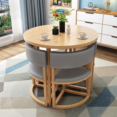 Versatile Round Table With Comfortable Nesting Chairs