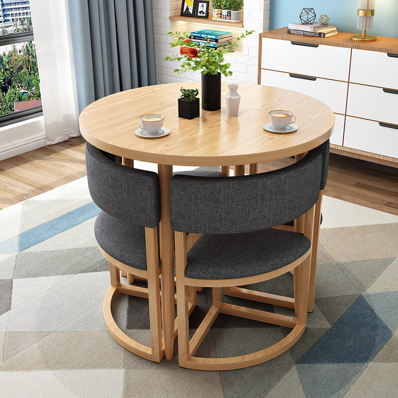 Versatile Round Table With Comfortable Nesting Chairs