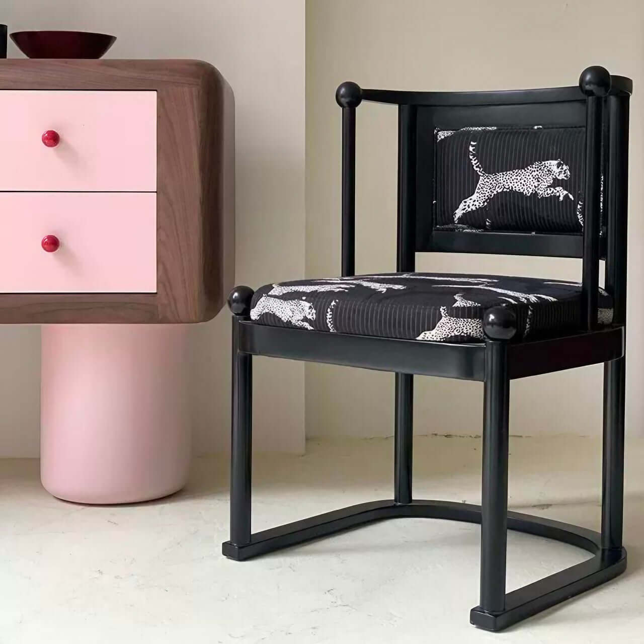 Single vintage dining chair with black fabric and leopard print upholstery main product image Hauptbild