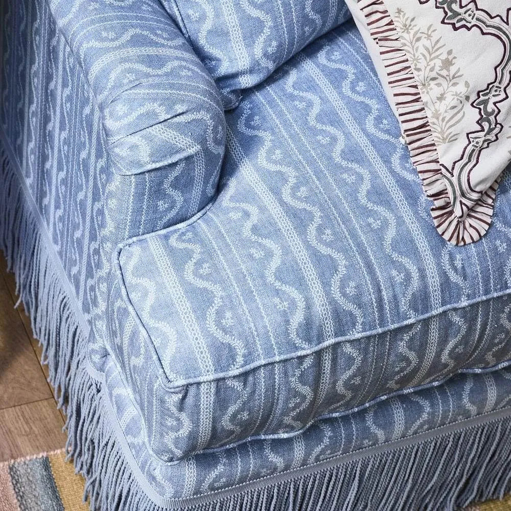 Vintage Patterned Fringe Sofa with Rolled Arms and Plush Cushions