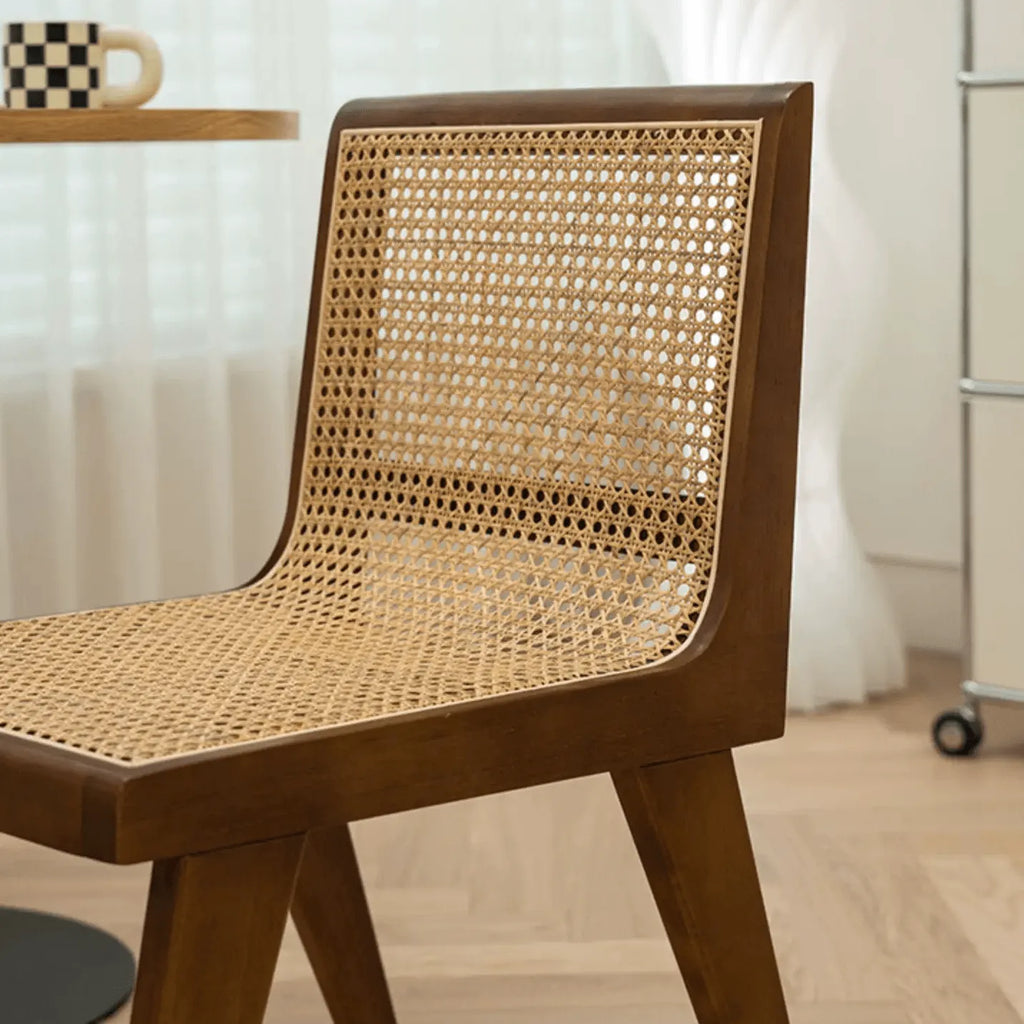 Vintage Rattan Dining Chair with Sculptural A-Frame Legs and Contoured Back