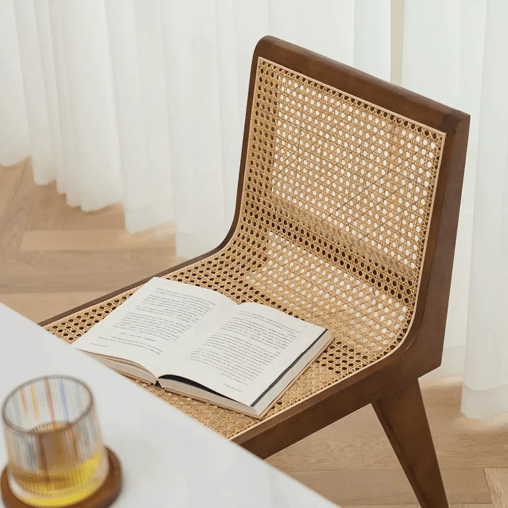 Vintage Rattan Dining Chair with Sculptural A-Frame Legs and Contoured Back