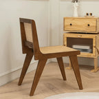 Vintage Rattan Dining Chair with Sculptural A-Frame Legs and Contoured Back