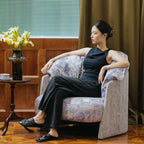 Violet Floral Accent Armchair with Embracing Curves and Retro Lounge Appeal