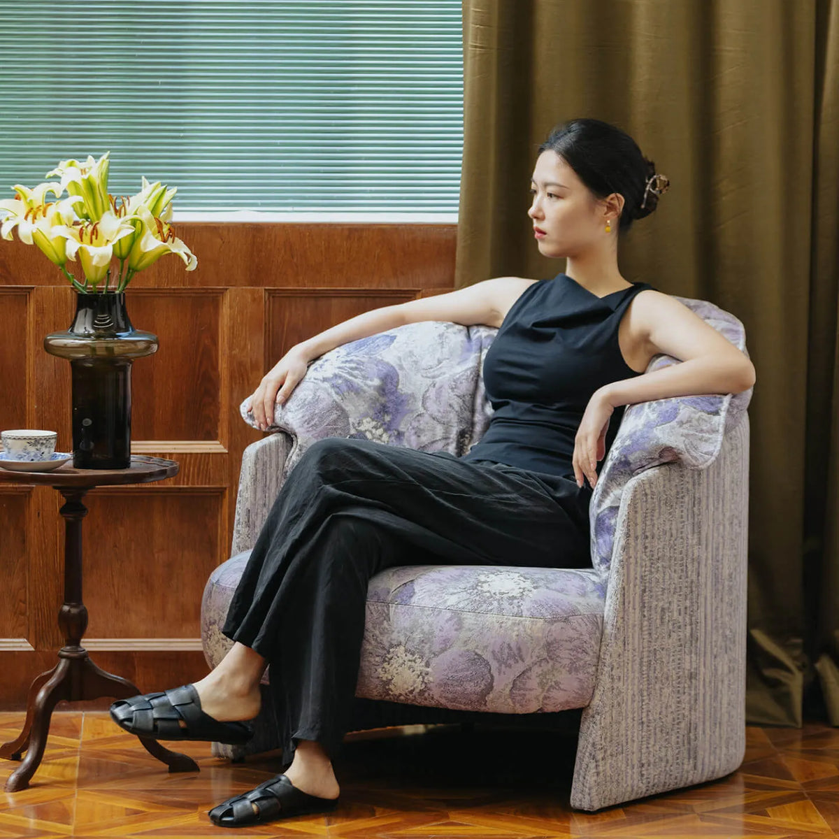 Violet Floral Accent Armchair with Embracing Curves and Retro Lounge Appeal